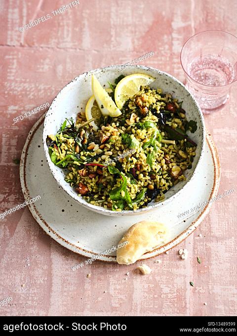 Freekeh with leaf salad and nut-pine nut crunch