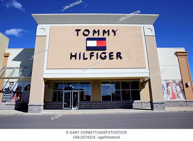 The entrance and exterior of a Tommy Hilfiger factory outlet mall store in Ontario, Canada, Stock Photo, Picture Rights Image. Pic. U06-2074224 |