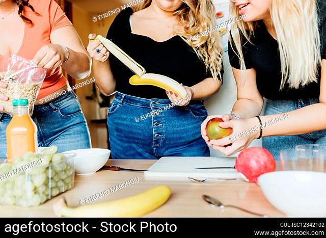 Women preparing fruit