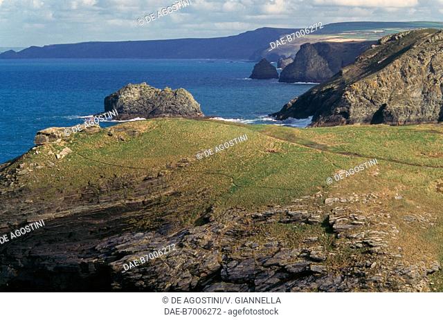 Rocky promontories following one another towards Port Gaverne, seen from Tintagel village, Cornwall, United Kingdom