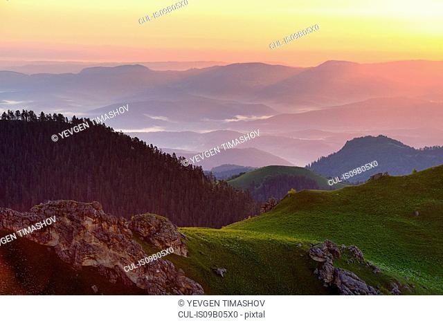 Landscape with mist at dusk, Bolshoy Thach (Big Thach) Nature Park, Caucasian Mountains, Republic of Adygea, Russia