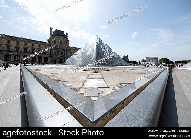 SYMBOL - 23 August 2023, France, Paris: Exterior shot of the Louvre Museum. Photo: Silas Stein/dpa. - Paris/Paris/France