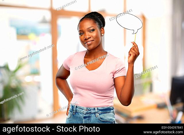 african woman with speech bubble at office