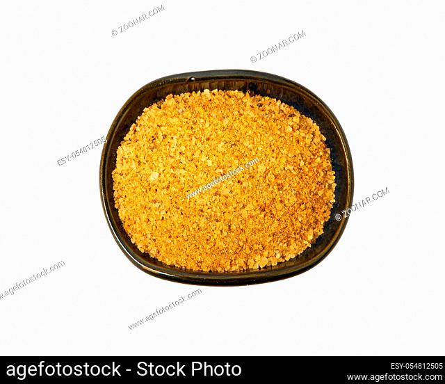 A mixture of seasonings in a bowl isolated on a white background. Spice on isolate. View from above