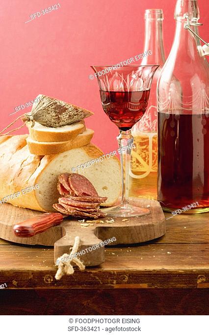 Hungarian salami, white bread and red wine