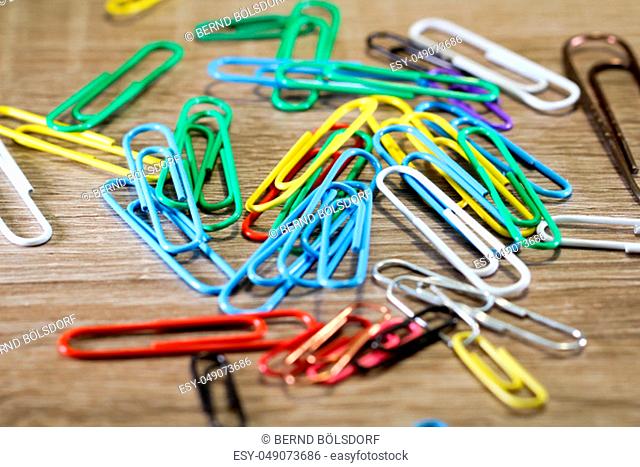 Bunch of color paperclips on a table