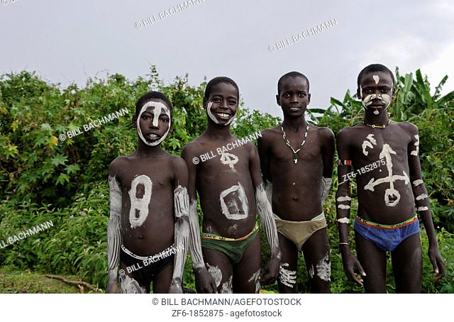 Key Afer Ethiopia Africa village Lower Omo Valley closeup of two Bena boys with white paint on their bodies 15