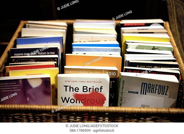 A Basket of Used Books, offered for sale at a Thrift Shop