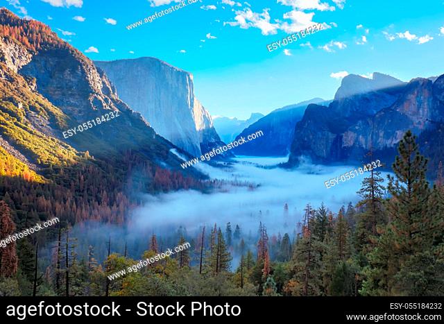 The iconic view of Yosemite Valley and the magnificent El Capitan at sunrise from Tunnel View in California, USA