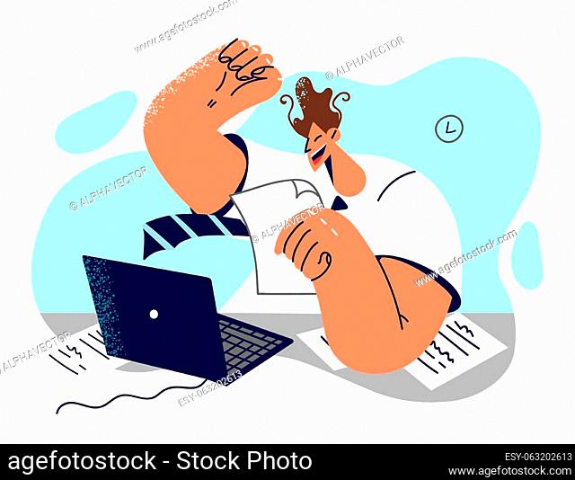Happy man office worker looks at laptop and rejoices in receiving important email with profitable business offer. Business man doing office work feels like...
