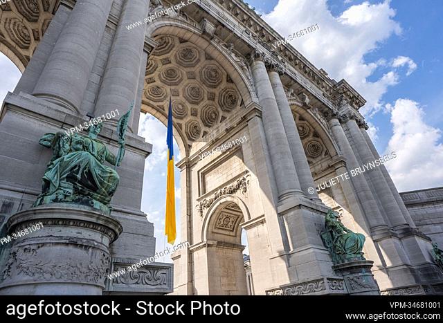 Illustration picture shows the Ukrainian flag as it hangs from the center of the triumphal arch (arc de triomphe - triomfboog) at the Jubelpark - Parc du...