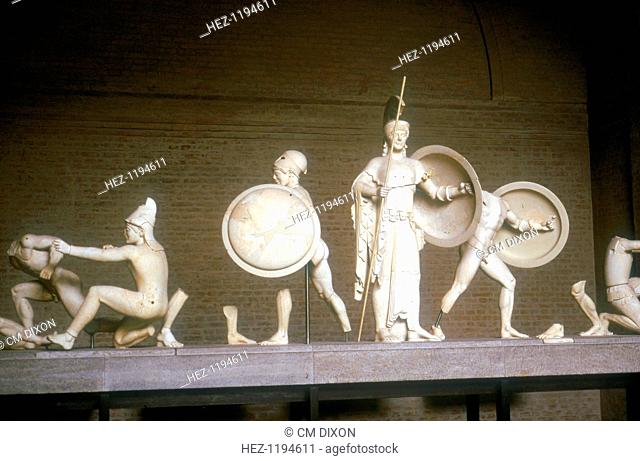 Reconstruction of part of the West Pediment of the Temple of Aphaia, Aegina, Greece, c500-480 BC. Athena is pictured in the centre