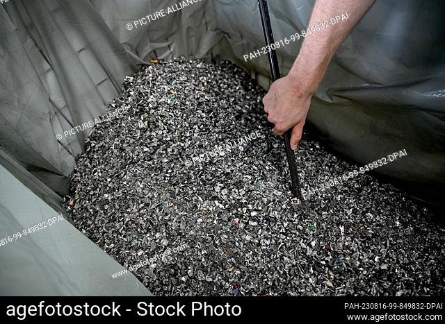PRODUCTION - 31 July 2023, Berlin: Looking into a garbage can of shredded hard drives at Interzero Product Cycle, a facility for refurbishing electronic...