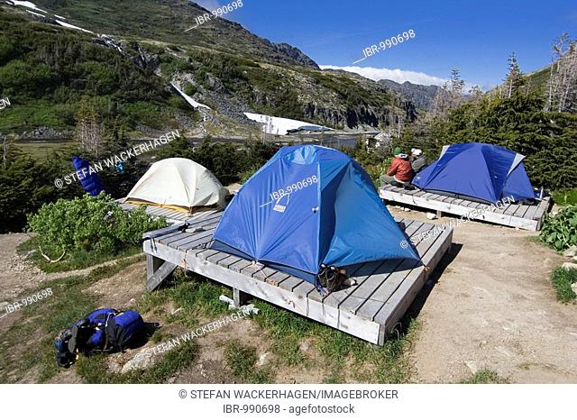 Tents on wooden platforms, Happy Camp camp ground at the Chilkoot Pass/Trail, Klondike Gold Rush, British Columbia, B.C., Canada, North America
