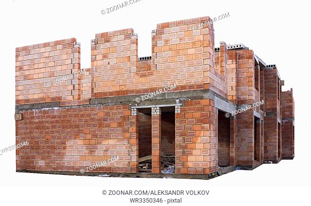 The beginning of construction of the rural house from red bricks. Mass production. Isolated on white