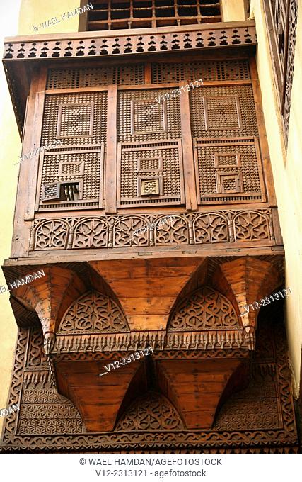 Islamic decorated wooden window called mashrabiya, at Bait el-harawi, an Arabic house, City of Cairo, Egypt