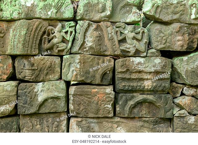Jumble of decorated stone blocks from temple