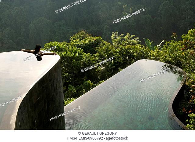 Indonesia, Bali, Gianyar, Buahan Payangan, Ubud Hanging Gardens hotel group Orient-Express, one young woman back outstretched arms