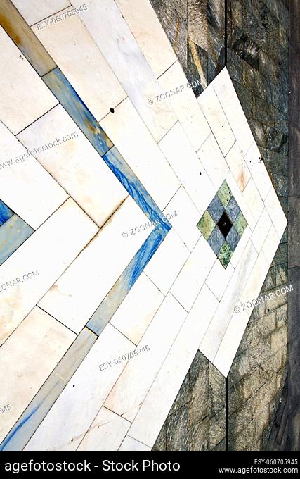 sanpietrini busto arsizio street lombardy italy varese abstract  pavement of a curch and marble