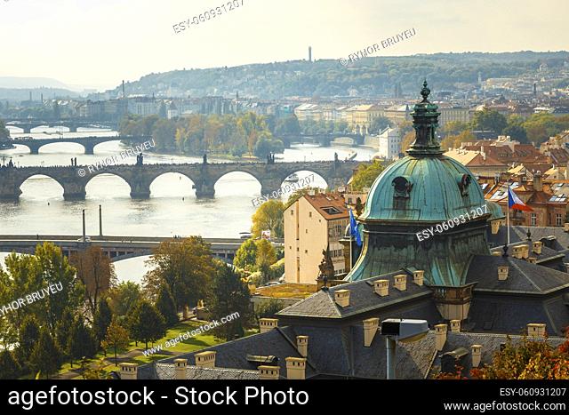 Aerial view of cityscape of Prague, Czech Republic. In the right part of photo we can see the blue dome of the Straka Academy