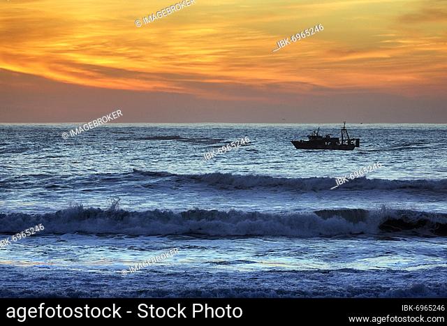 Fishing boat in the surf, blue hour, Atlantic coast, Essaouira, Marrakech-Safi, Morocco, Africa