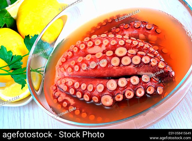 boiled octopus soup with broth seasoned with chili pepper and served to you with lemon