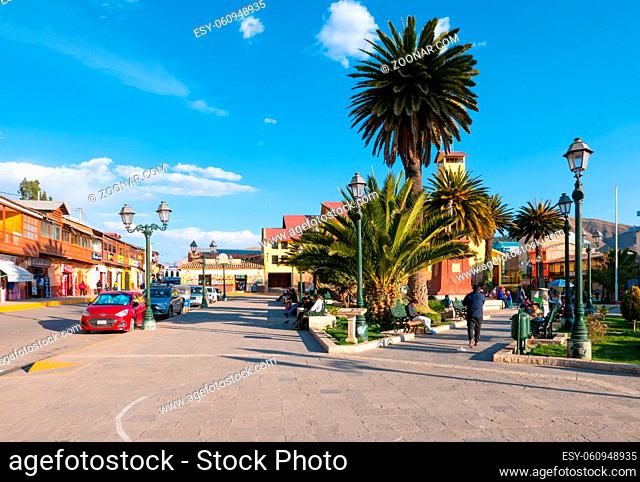 Sicuani Peru, August 16 public gardens with palm trees in Arms Square a meeting point for locals and tourists. Shoot on August 16, 2019
