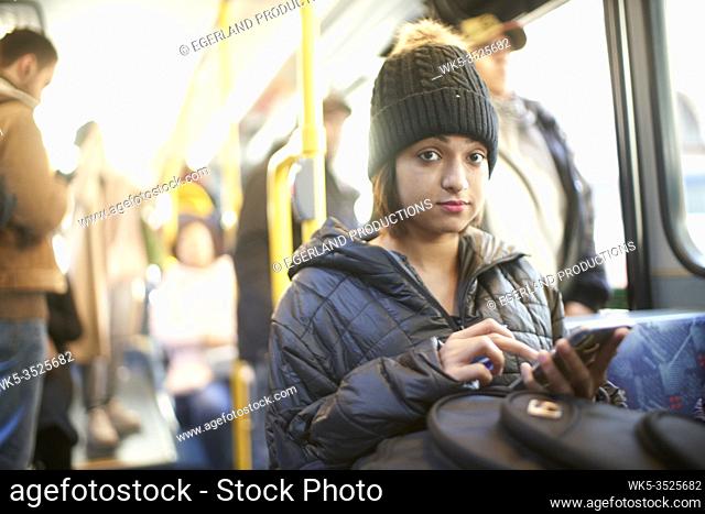 Young woman in bus