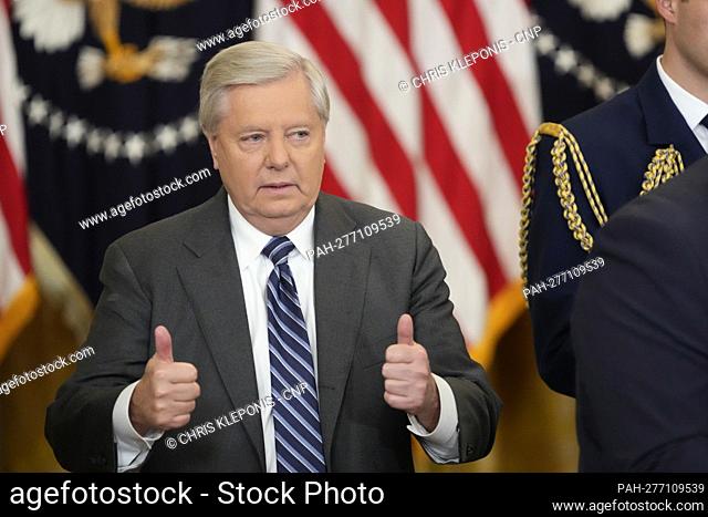 United States Senator Lindsey Graham (Republican of South Carolina) gestures prior to US President Joe Biden signing H.R