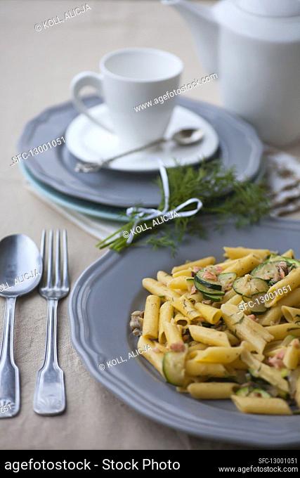 Penne with salmon and zucchini