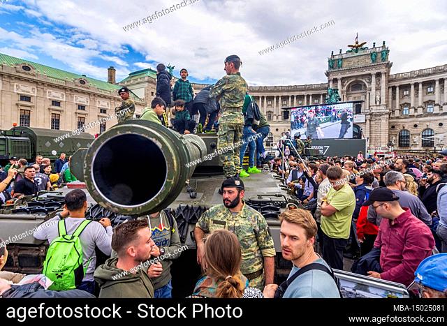 Vienna, main battle tank Leopard 2 A4 at show of Austrian army Bundesheer on national holiday in front of palace Hofburg at square Heldenplatz, soldiers