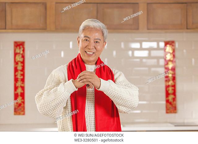 Chinese old man celebrates the Spring Festival