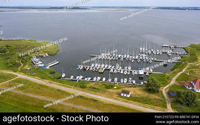 25 June 2021, Mecklenburg-Western Pomerania, Hiddensee: View of the sailing harbour of Vitte. With about 500 inhabitants