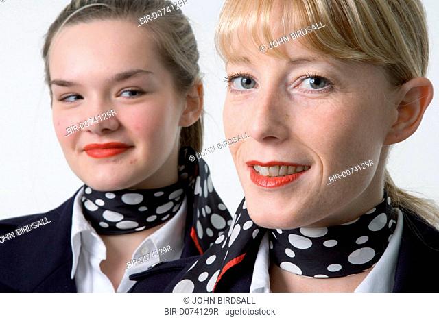 Two women, dressed as air stewardesses, who offer a mobile retail service selling essential personal products in Nottingham nightclubs and social venues