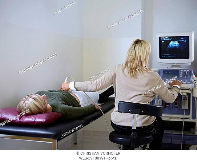 Woman in hospital getting sonogram
