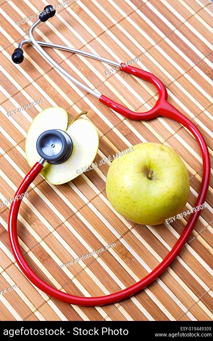 stethoscope and apple