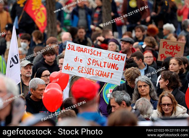22 October 2022, Berlin: A banner reading ""Solidarity against the division of society"" is seen in Invalidenpark during a demonstration