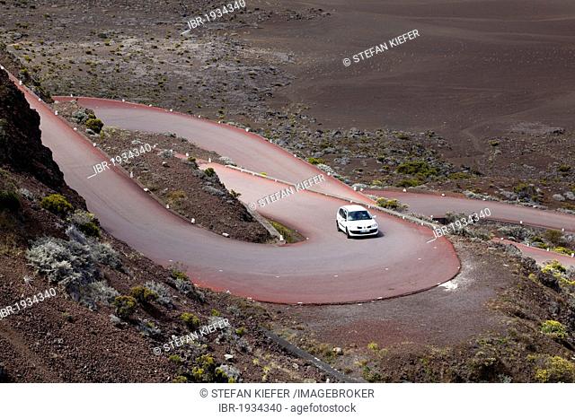 Road on the Plaine des Sables plateau at the foot of the Piton de la Fournaise volcano, La Reunion island, Indian Ocean
