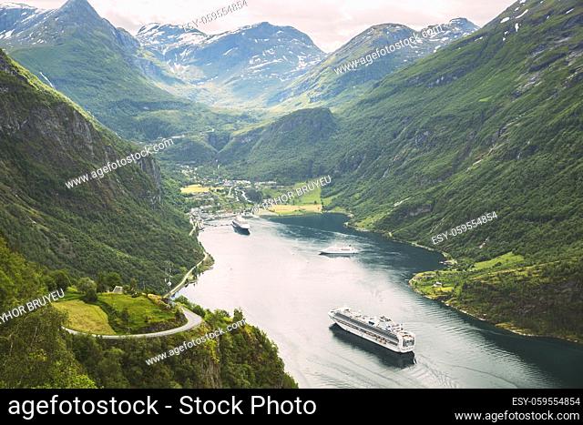 Geirangerfjord, Norway. Touristic Ship Ferry Boat Cruise Ship Liner Floating Near Geiranger In Geirangerfjorden In Summer Day