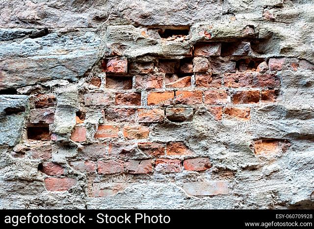 Broken cement brick wall exterior background