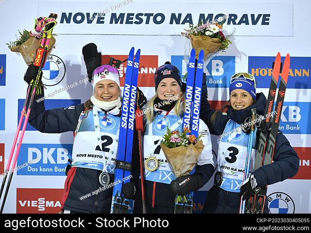 (L-R) Second placed Ingrid Landmark Tandrevold of Norway, winner Marte Olsbu Roeiseland of Norway and third placed Anais Chevalier-Bouchet of France during the...