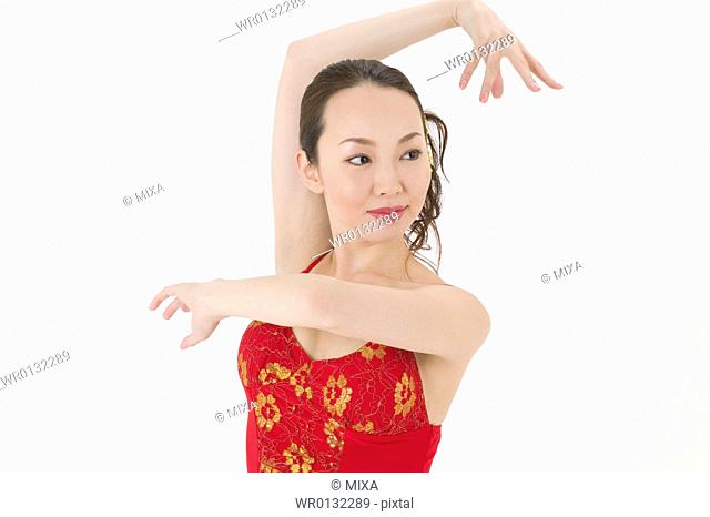 Young woman dancing salsa
