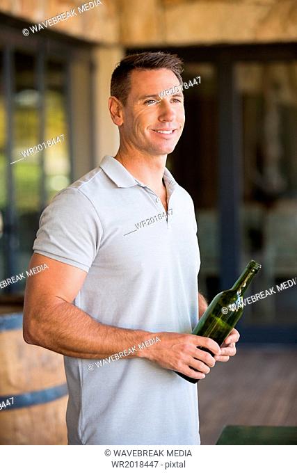 A man tasting wine