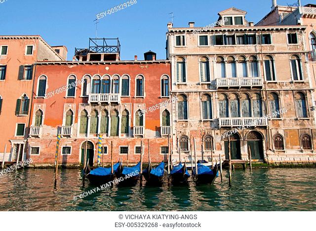 goldola boat parking in grand canal Venice Italy