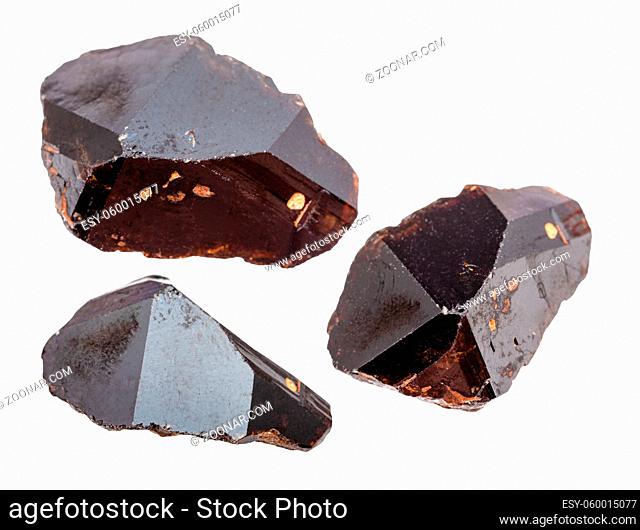 set of Cassiterite (tin ore) crystals isolated on white background