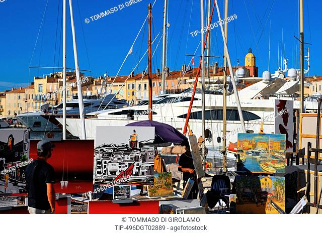 France, Saint Tropez, painters selling their art on Quai Jean Jaurés