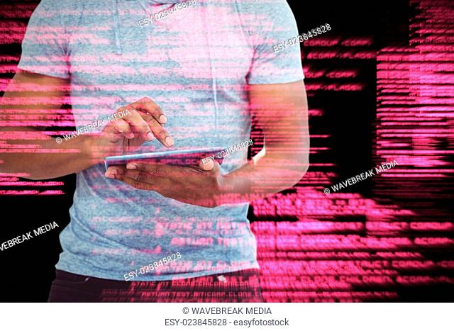 Composite image of mid section of man using tablet