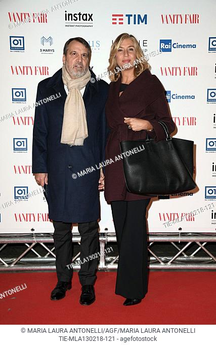 Former soccer player Marco Tardelli, Myrta Merlino during the red carpet of film A casa tutti bene, Rome, ITALY-12-02-2018
