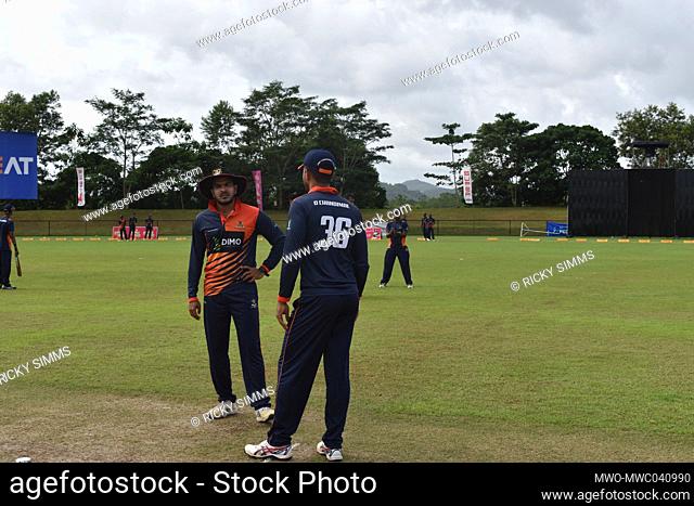 Sri Lankan cricketers Dinesh Chandimal and Angelo Perera having a chat. The picturesque Army Ordinance cricket grounds. Dombagoda. Sri Lanka