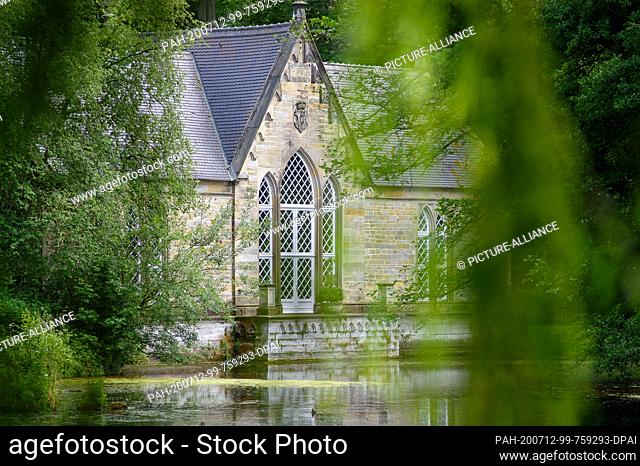 07 July 2020, Saxony-Anhalt, Harbke: The orangery in the Harbke Castle Park. The house was built between 1830 and 1831 as a greenhouse in neo-Gothic style and...